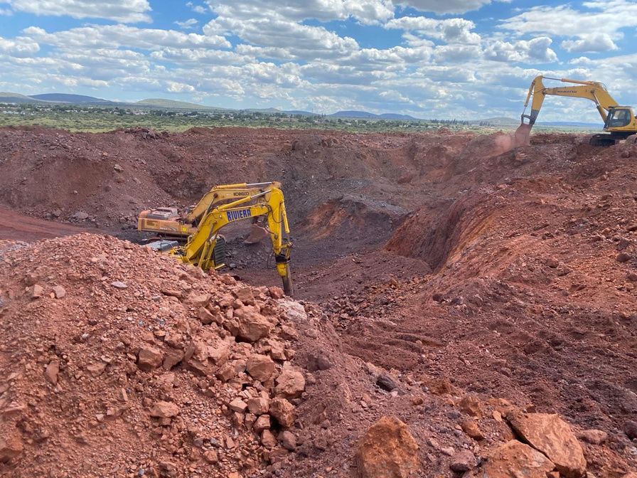 Excavator working in an open pit